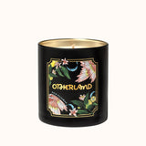 Black candle with floral design and 'Otherland' branding on a white background
