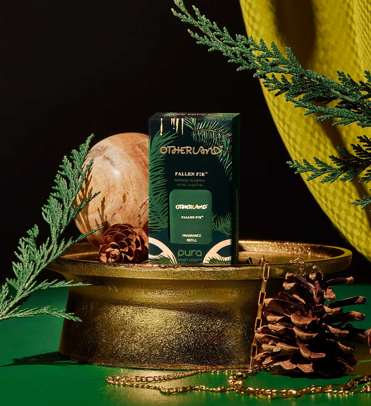 Otherland Fallen Fir product packaging with decorative elements on a dark background