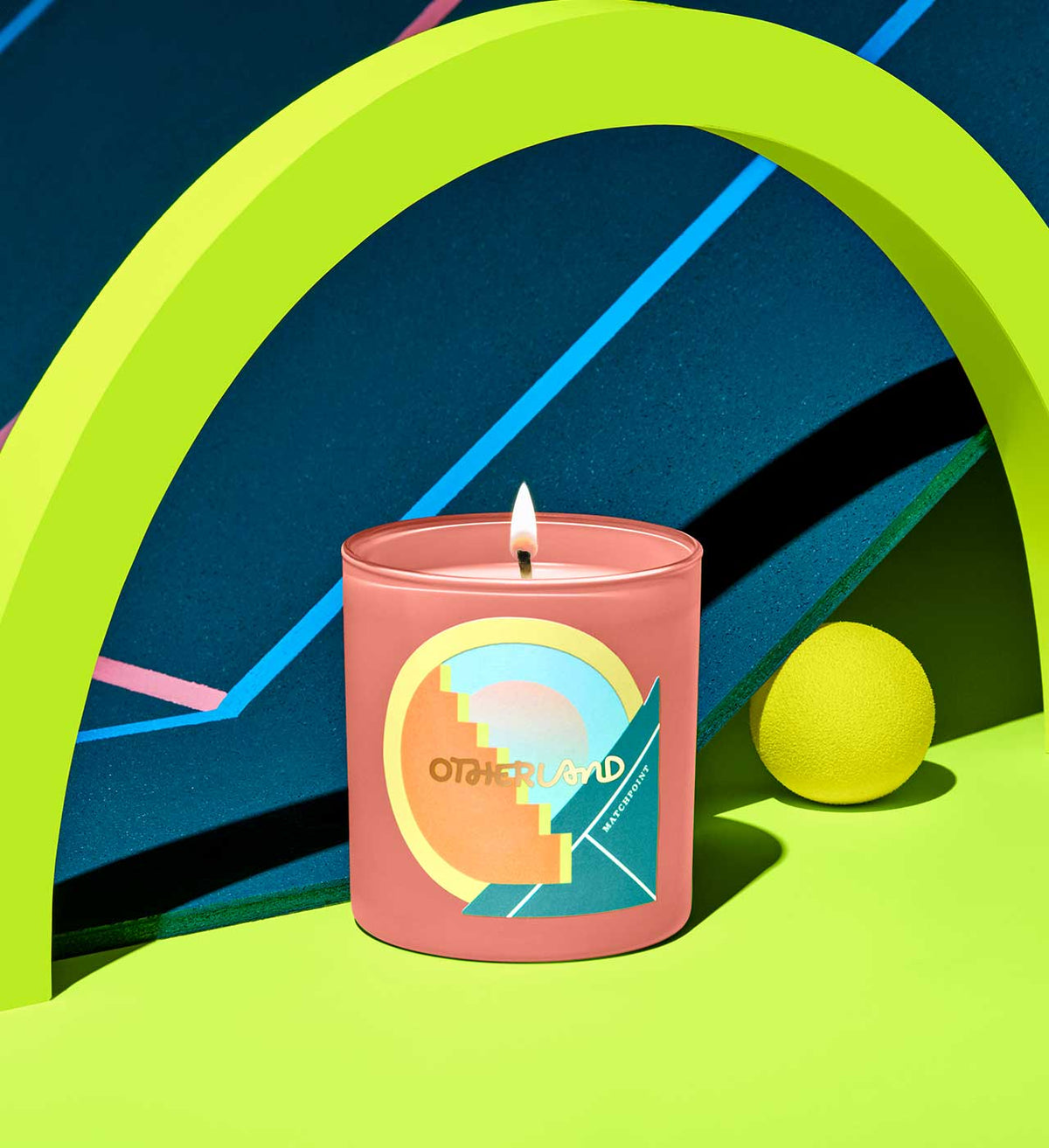 Candle with a colorful label on a vibrant background